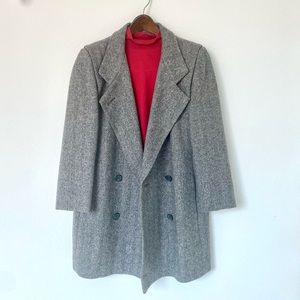 Lady’s classic grey wool collared peacoat with double-breasted button front.